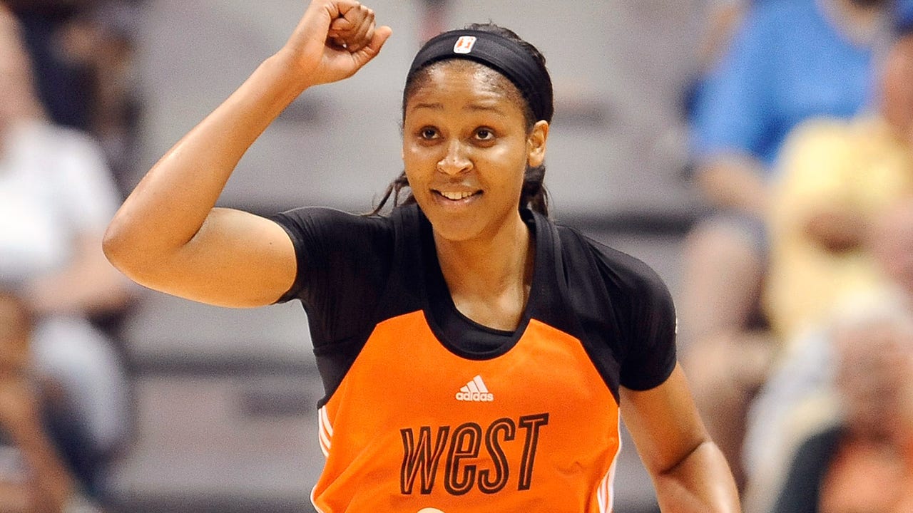 Moore scores WNBA All-Star record 30, leads West past East